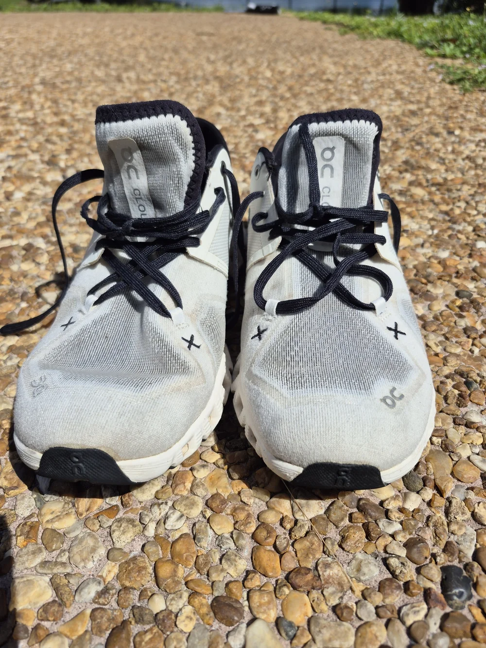 On Running Men’s Cloud Athletic Sneakers in White and Black